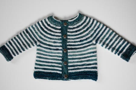 A two year old. A finished sweater.